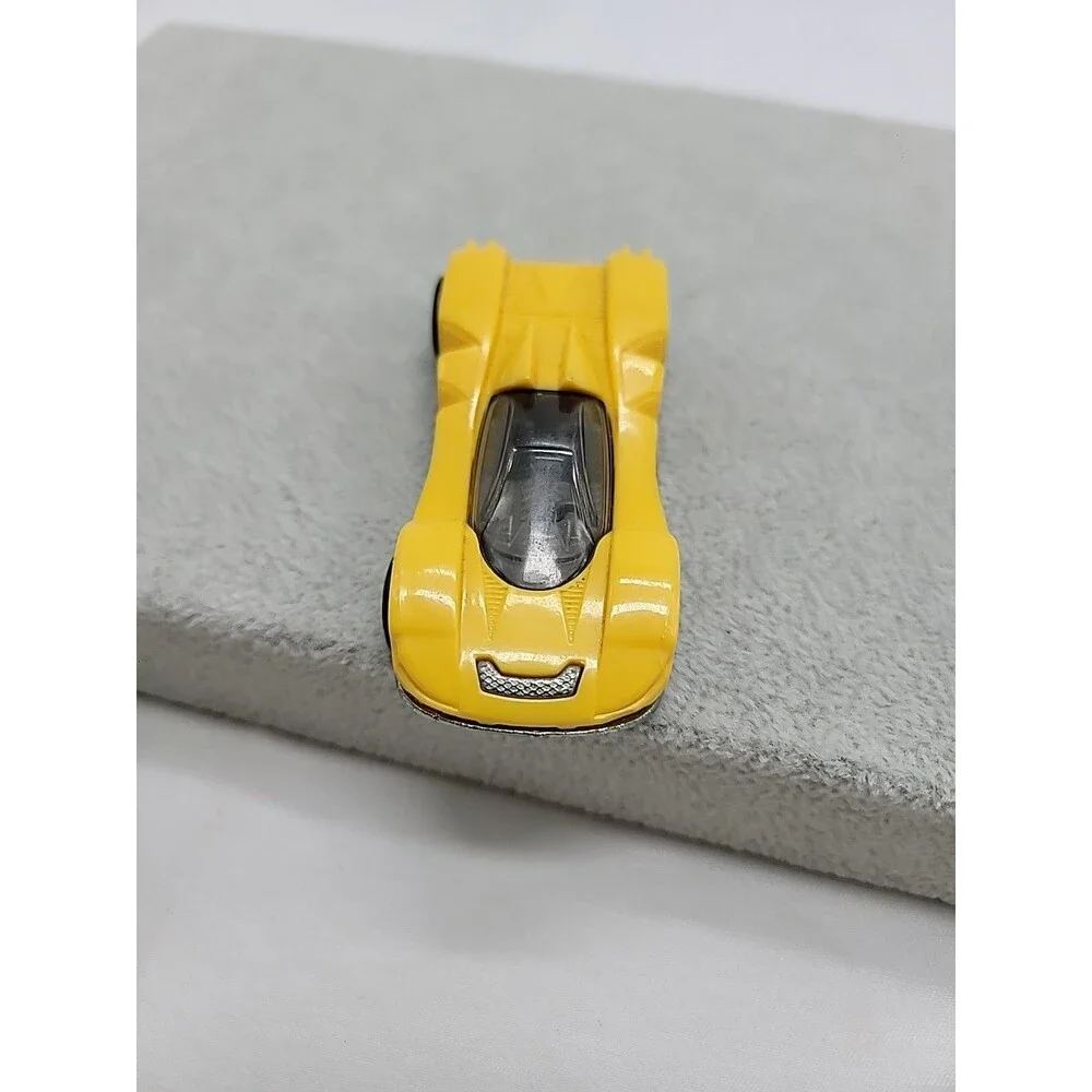 Hot Wheels Teegray Yellow Exotic Sports Car with Chrome Wheels 1:64